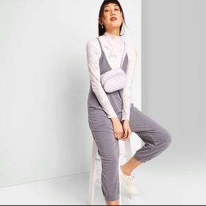 Returning THURS 4/22‼️Grey razor back jumpsuit